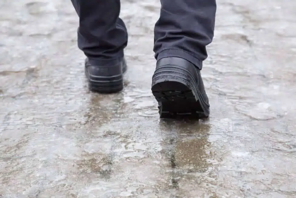Sprinkle charcoal it on icy sidewalks and driveways to help with traction