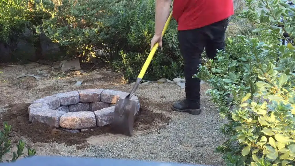 Fill Back the Edges and Compact the Dirt Surrounding Your Fire Pit
