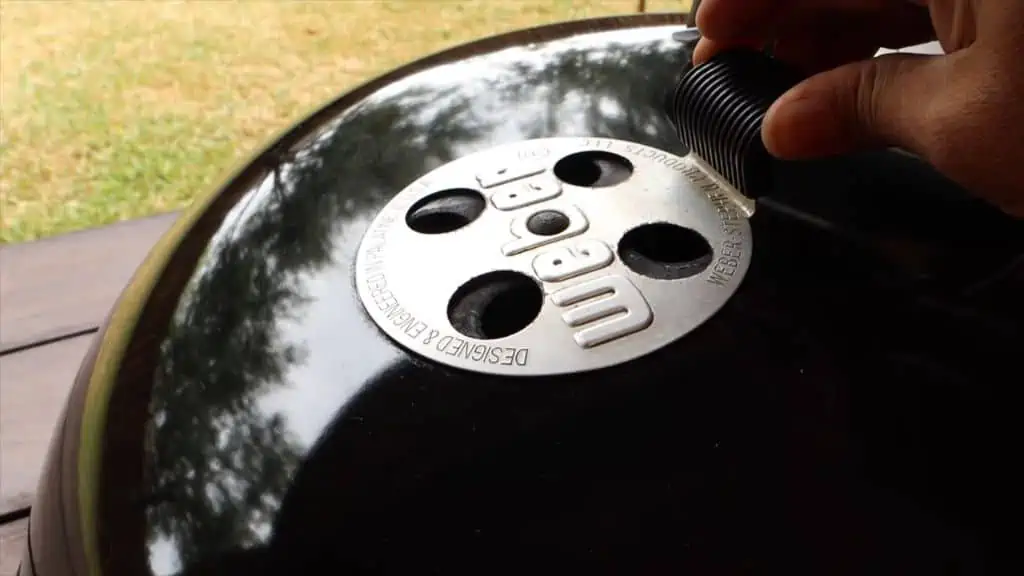 Increase or decrease airflow by adjusting your charcoal grill vents